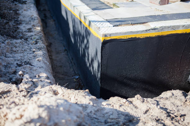 Professional Exterior Waterproofing technician working in Laceys Spring, AL